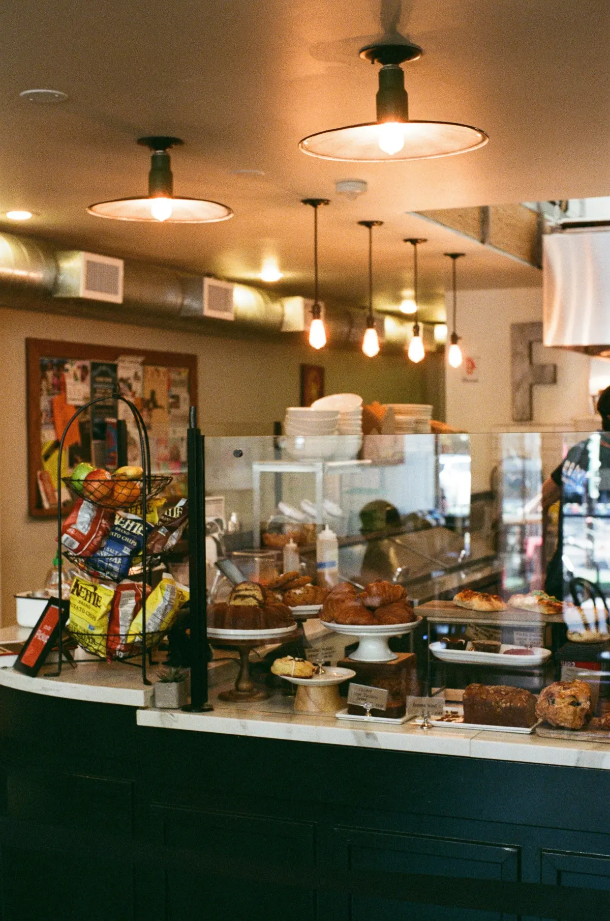 Restaurant owner reviewing POS system on a tablet